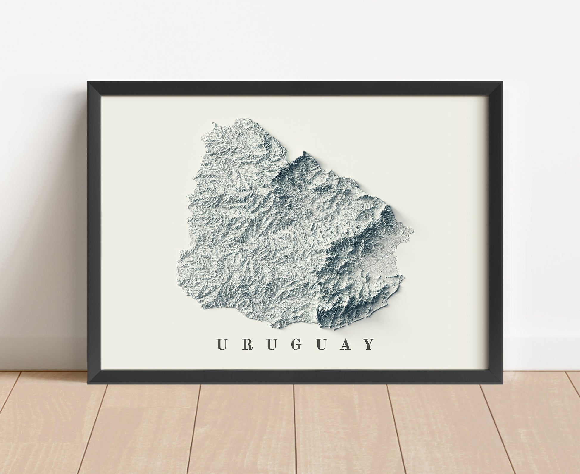 Uruguay shaded relief map in black frame. Artistic print with realistic terrain effect for wall decor