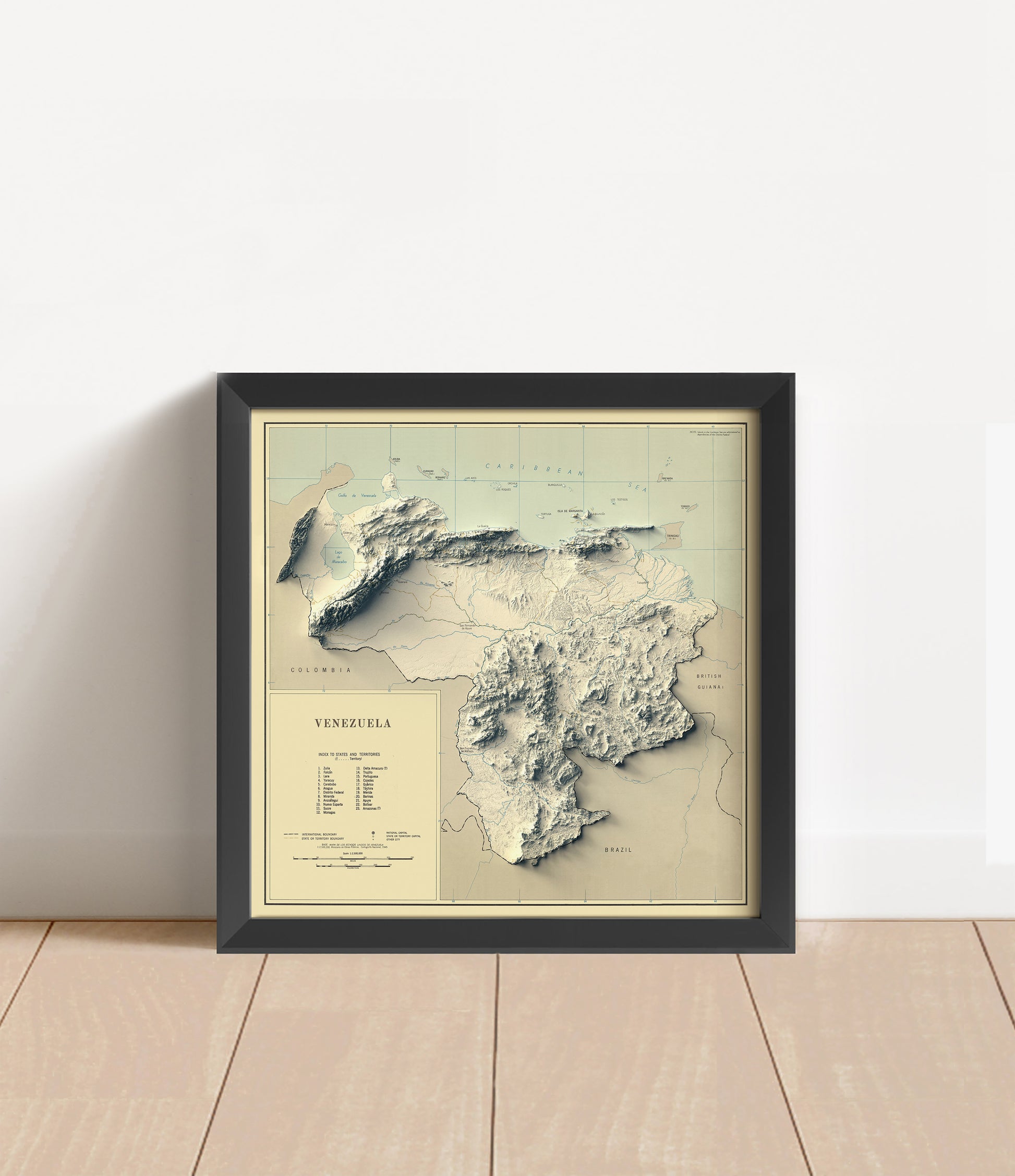 Vintage Venezuela shaded relief map in black frame. Artistic print with realistic terrain effect for wall decor