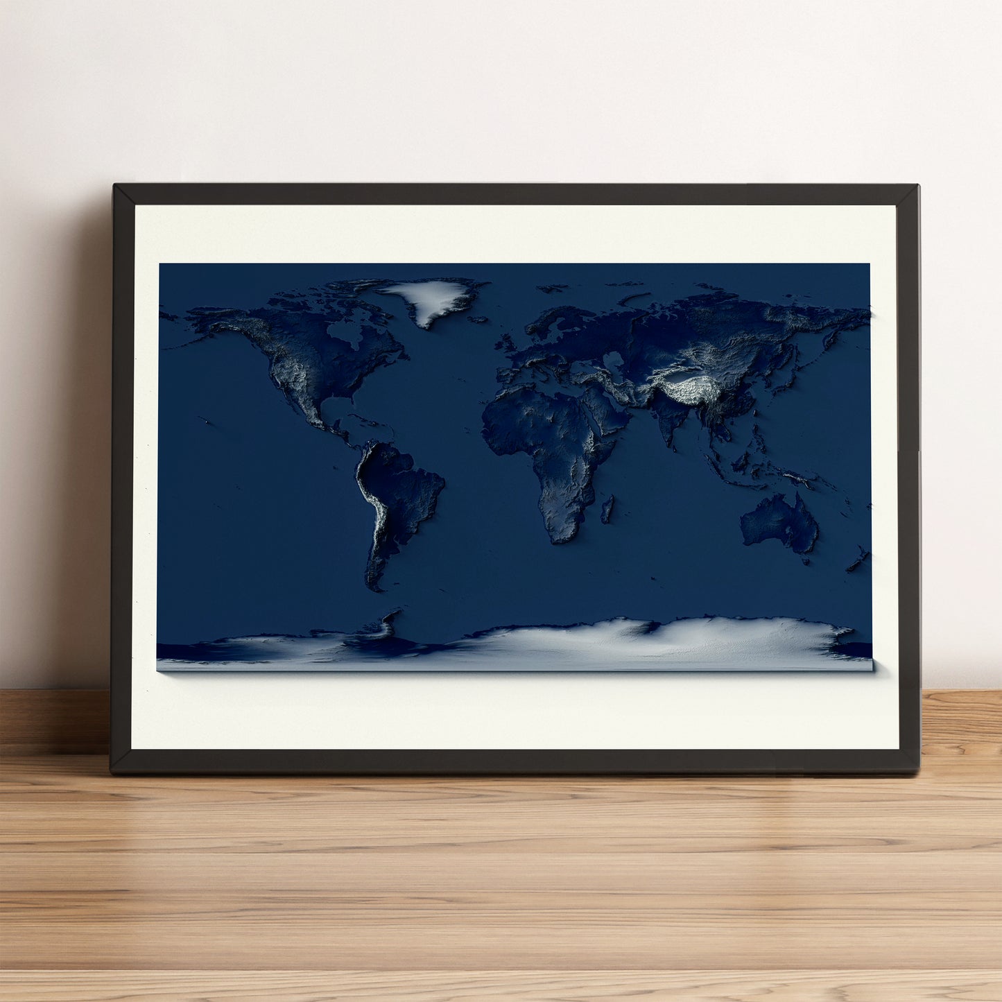 World framed shaded relief map with dark tones in black frame. Artistic print highlighting mountains with a realistic terrain effect