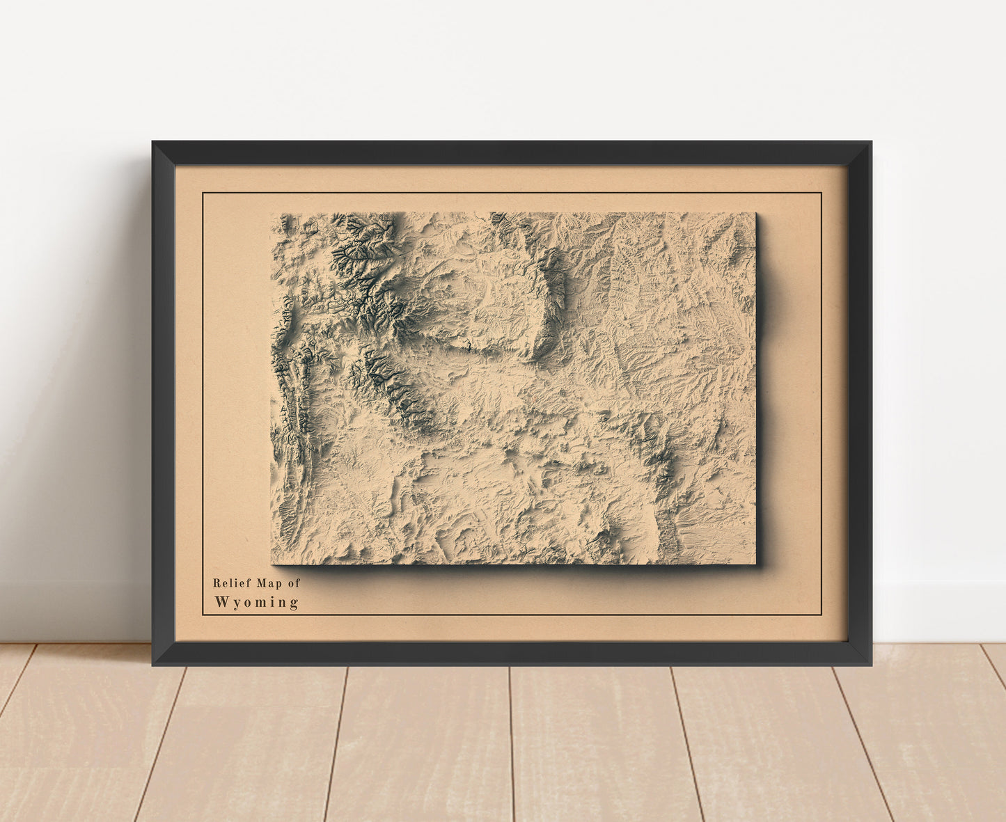 Vintage Wyoming shaded relief map in black frame. Artistic print with realistic terrain effect for wall decor