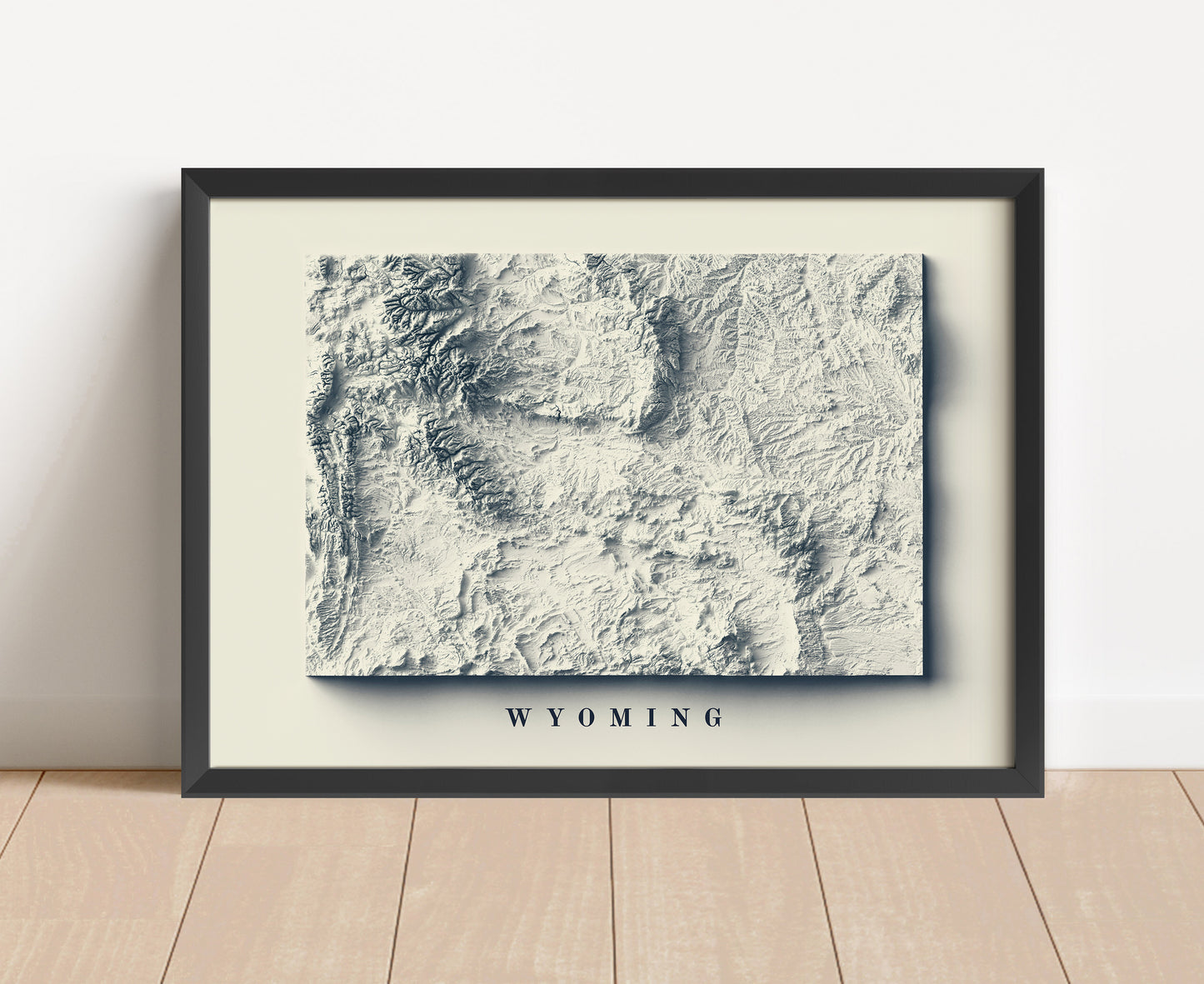 Wyoming shaded relief map in black frame. Artistic print with realistic terrain effect for wall decor