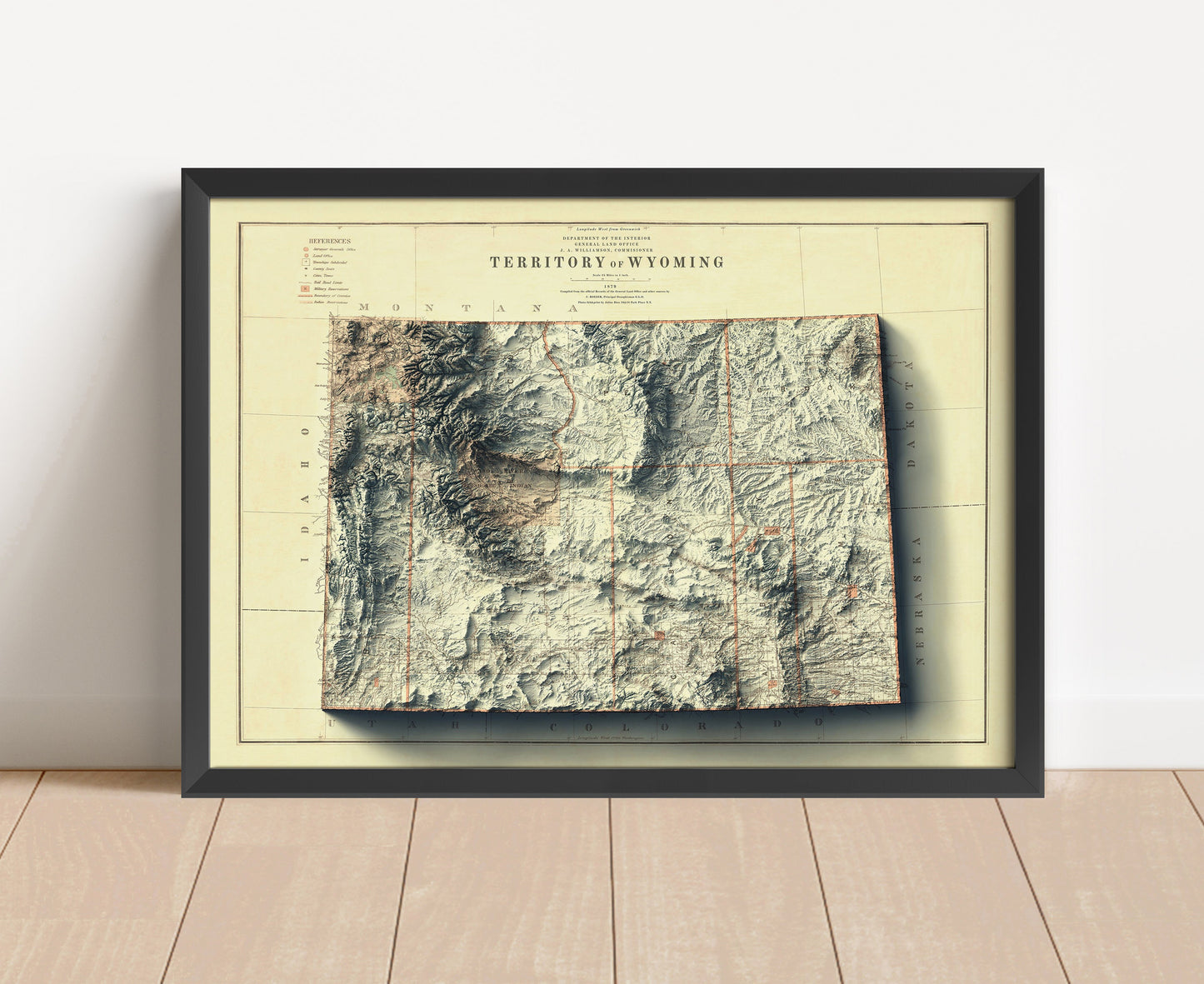 Vintage Wyoming shaded relief map in black frame. Artistic print with realistic terrain effect for wall decor