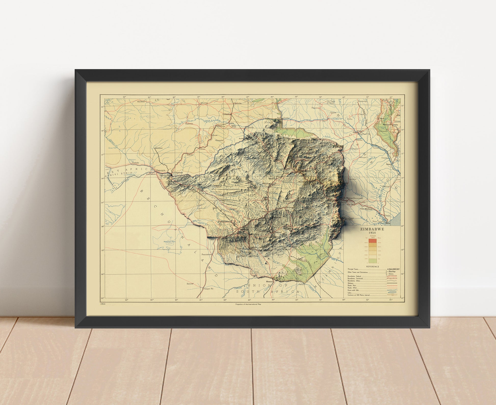 Vintage Zimbabwe shaded relief map in black frame. Artistic print with realistic terrain effect for wall decor