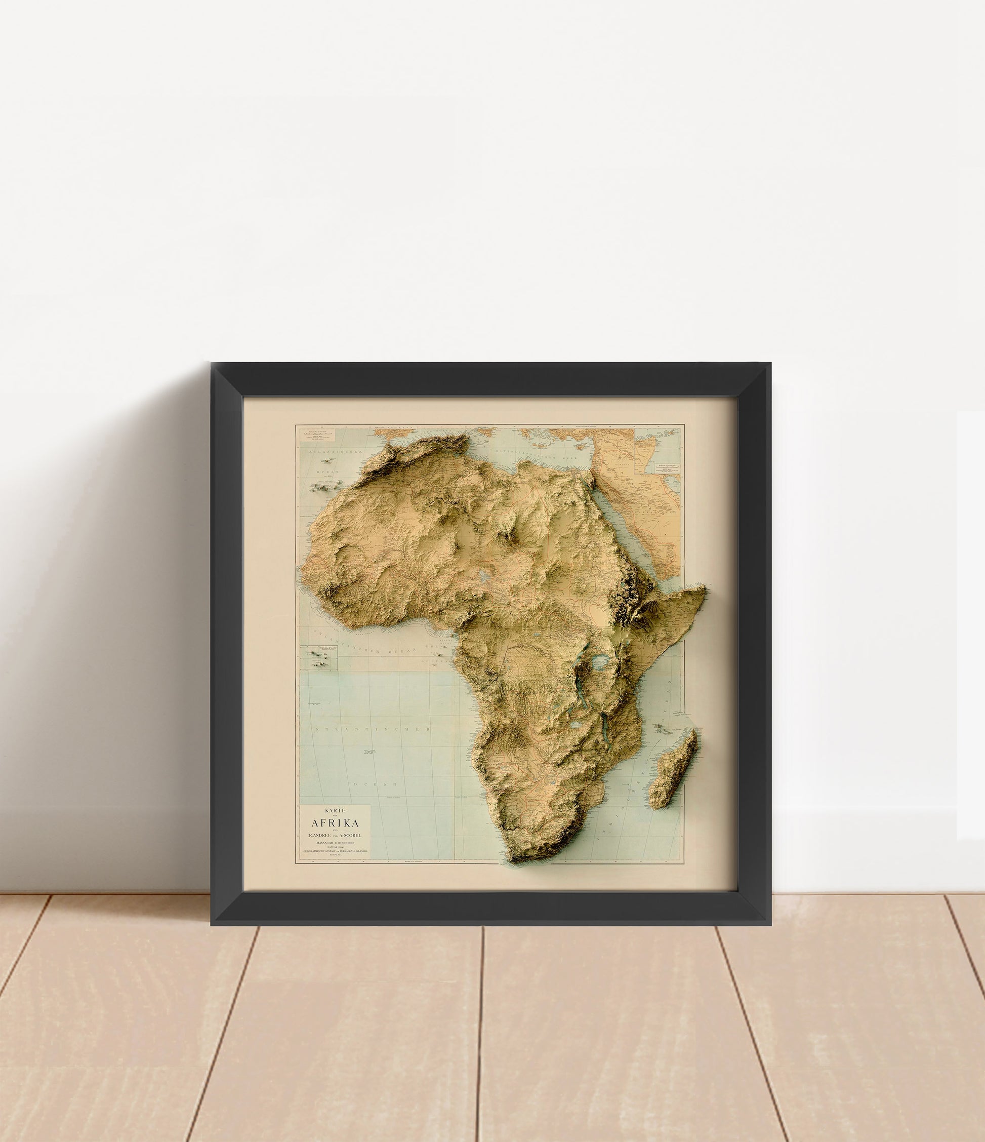 Vintage Africa shaded relief map in black frame. Artistic print with realistic terrain effect for wall decor