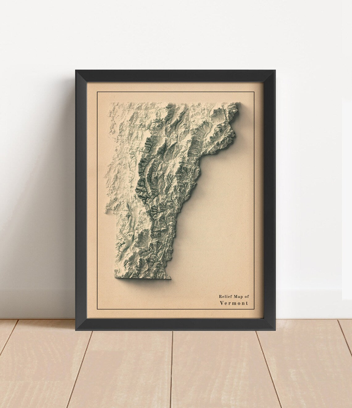 Vintage Vermont shaded relief map in black frame. Artistic print with realistic terrain effect for wall decor