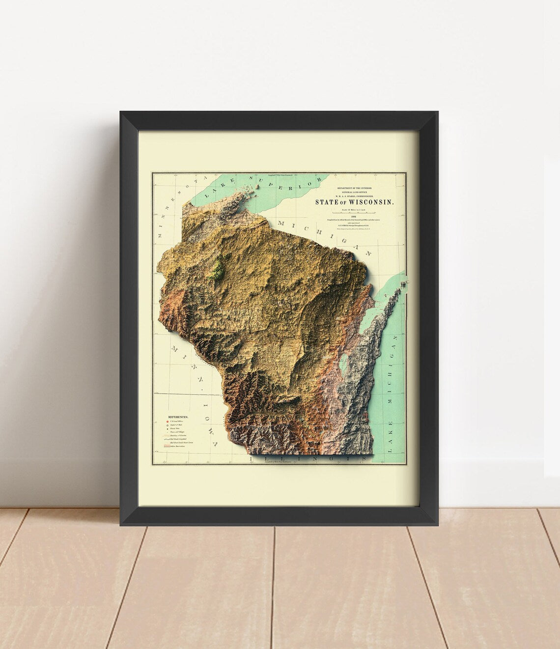 Vintage Wisconsin shaded relief map in black frame. Artistic print with realistic terrain effect for wall decor