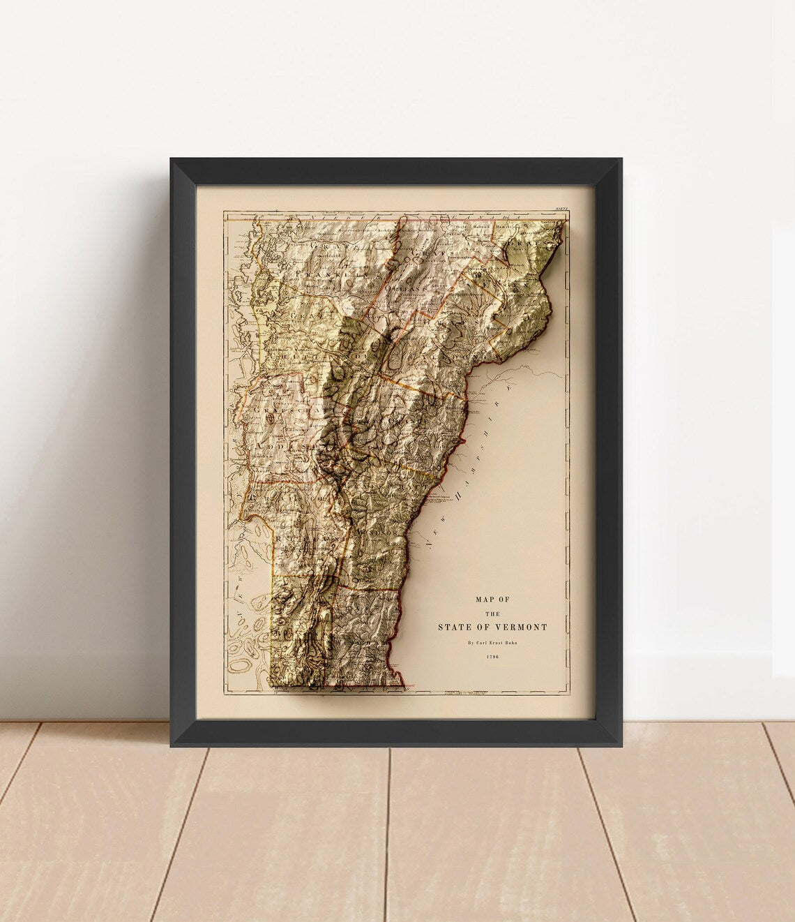 Vintage Vermont shaded relief map in black frame. Artistic print with realistic terrain effect for wall decor