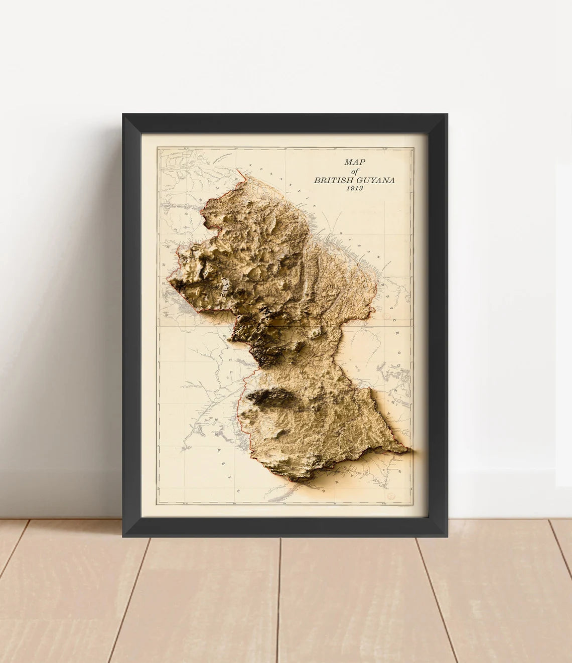 Vintage Guyana shaded relief map in black frame. Artistic print with realistic terrain effect for wall decor