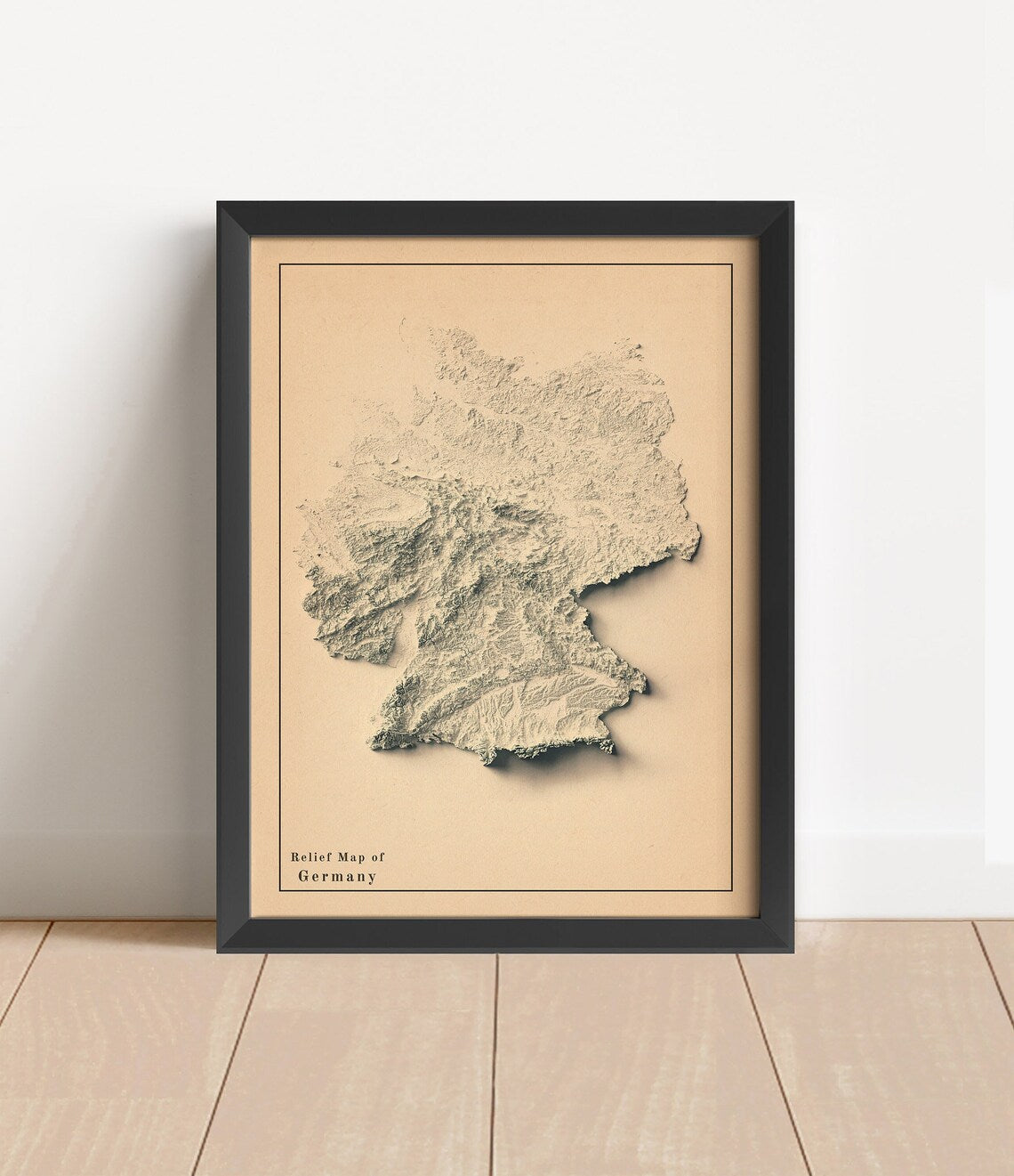 Vintage Germany shaded relief map in black frame. Artistic print with realistic terrain effect for wall decor