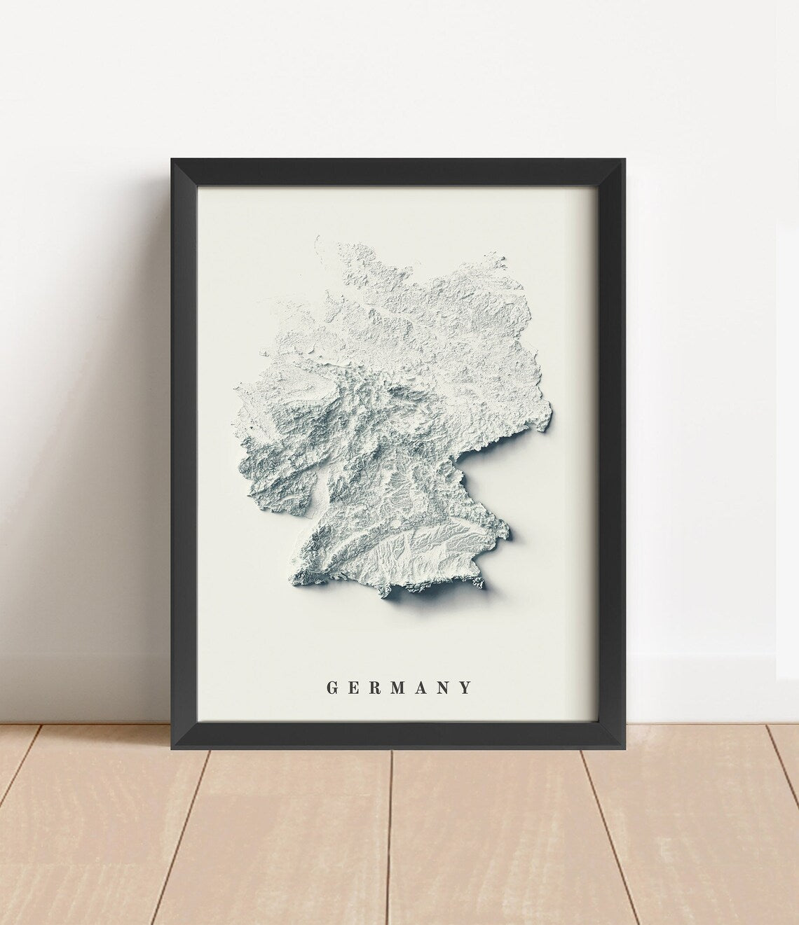 Germany shaded relief map in black frame. Artistic print with realistic terrain effect for wall decor