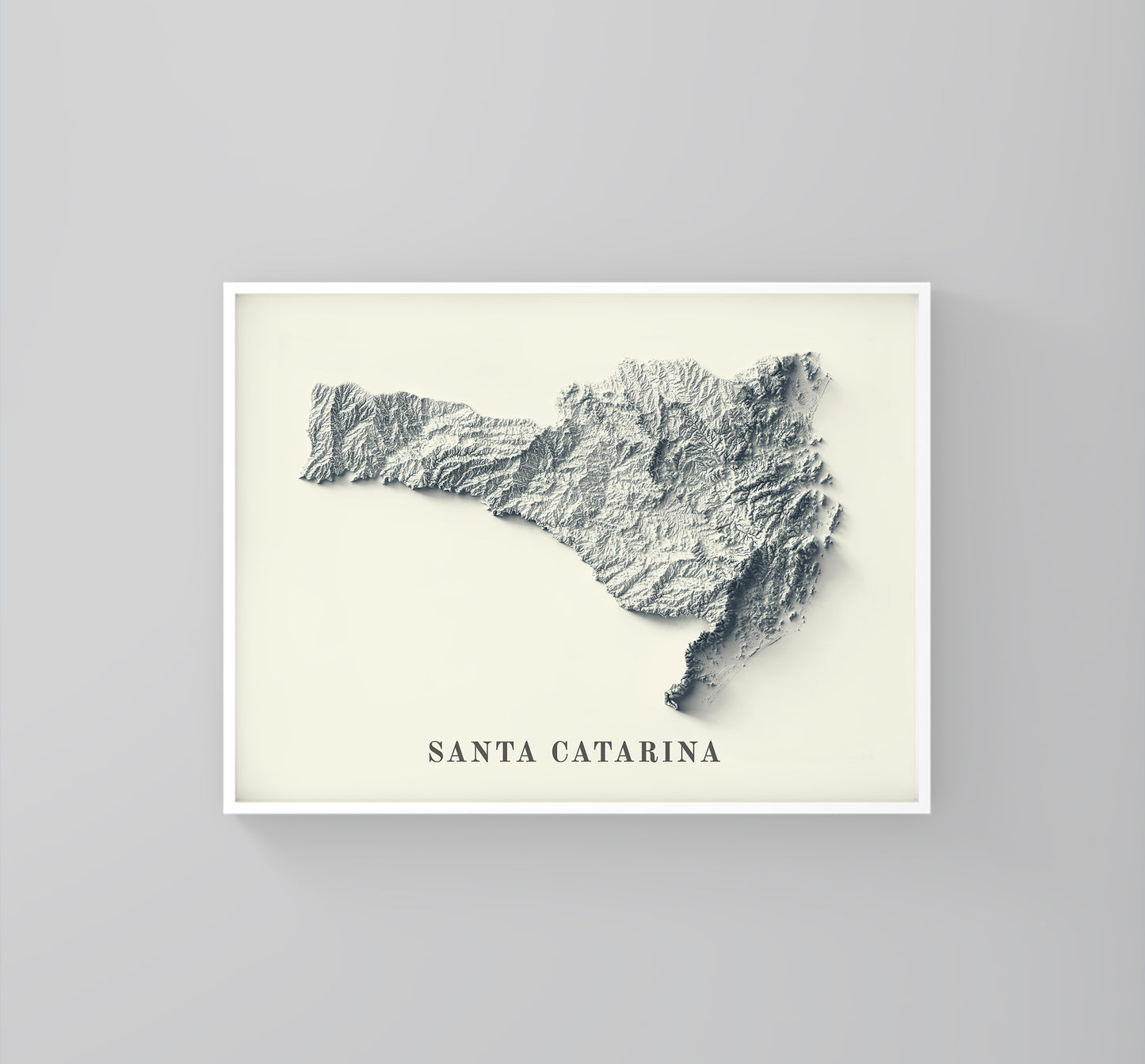 Vintage Ethiopia shaded relief map in a wooden frame. Realistic terrain art print for home decor, displayed against a brick wall