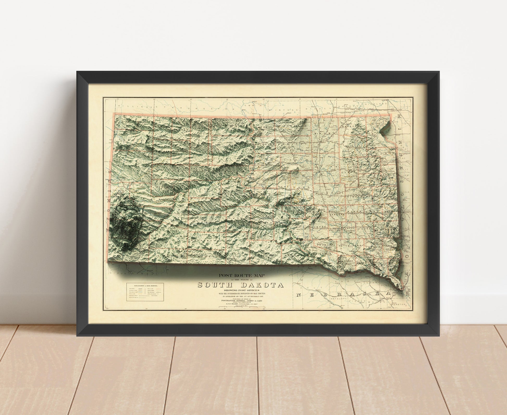 Vintage South Dakota shaded relief map in black frame. Artistic print with realistic terrain effect for wall decor