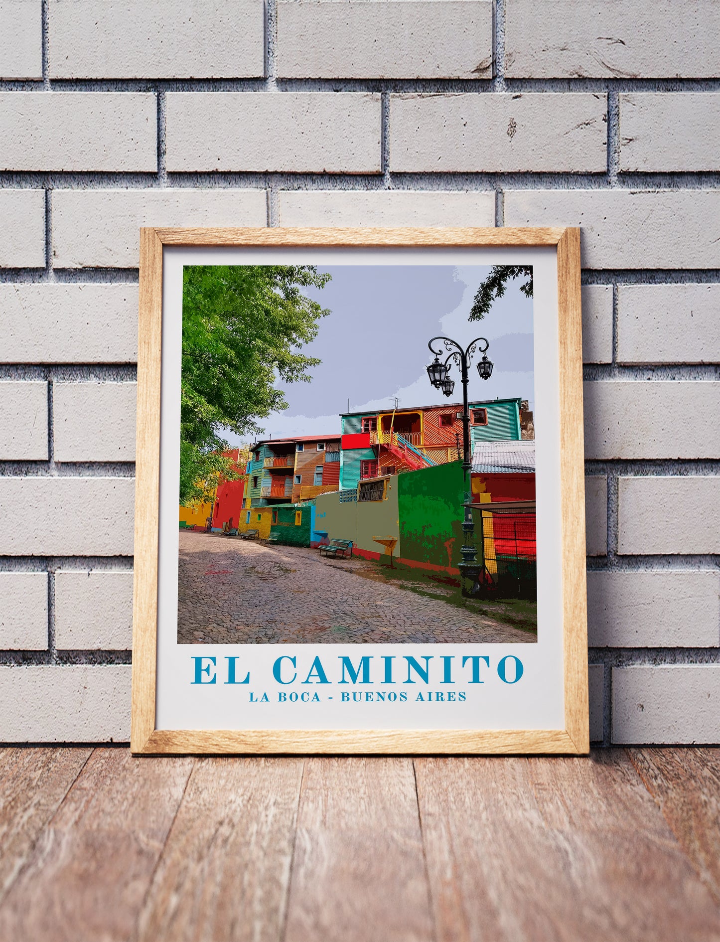 Vintage El Caminito, Buenos Aires, shaded relief map in a wooden frame. Realistic terrain art print for home decor, displayed against a brick wall